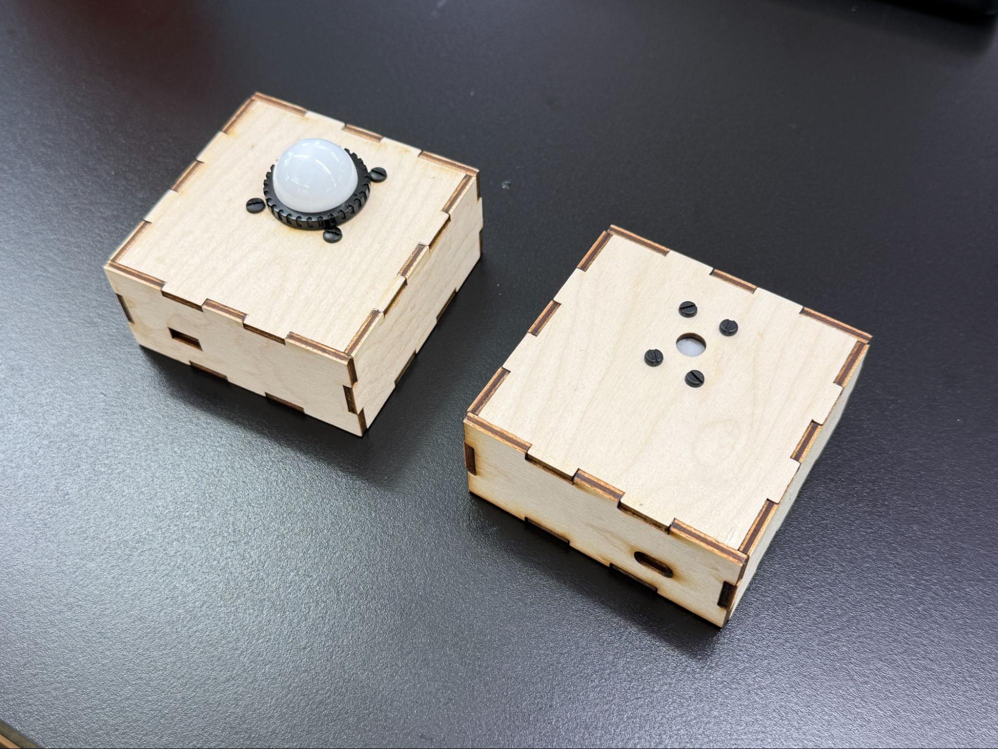 photo of two housings for the AS7341 spectral sensor and its supporting electrical components